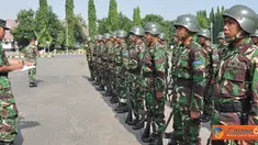 Citizen6, Surabaya: Lomba yang membutuhkan konsentrasi dan kekompakan dari setiap anggota tim ini, berbentuk peleton dengan jumlah 27 orang bersenjata laras panjang M.16, sangkur, pakaian loreng. (Pengirim: Penkobangdikal)