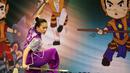 Atlet Wushu asal Filipina, Kariza Kris Chan saat beraksi, pada Kejuaraan Dunia Wushu 2015 di Istora Senayan, Jakarta, Minggu(15/11/2015). (Bola.com/Nicklas Hanoatubun)