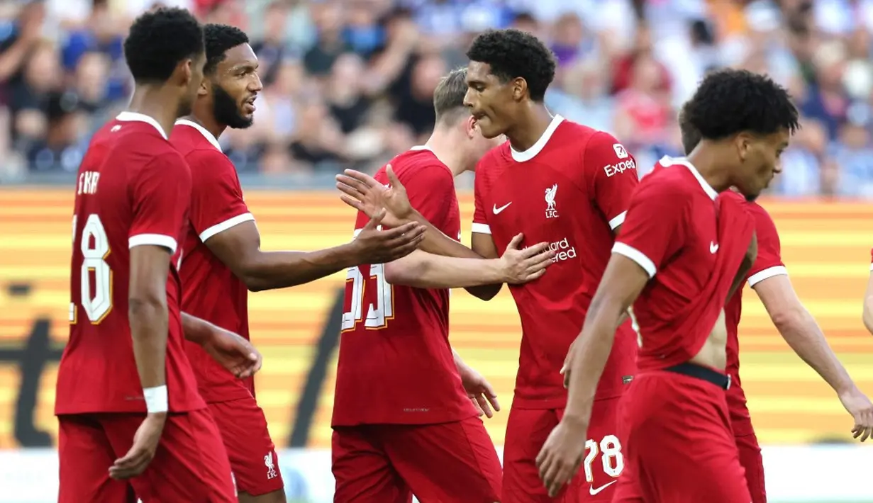 <p>Si Merah meresepon dengan menyetarakan angka pada menit ke-70 lewat gol Cody Gakpo. Pada menit akhir, Diogo Jota membawa Liverpool kembali memimpin di menit ke-90+2. Semenit berselang, Jota kembali mencetak gol sekaligus mengunci kemenangan Si Merah. (Daniel ROLAND/AFP)</p>