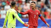 Hasil imbang yang diraih Timnas Portugal saat berjumpa Kongo pada laga perdana Grup K Piala Dunia 2026 mengarahkan sorotan kepada Cristiano Ronaldo, yang tak bisa berbuat banyak membantu timnya. (Molly Darlington/Getty Images/AFP)