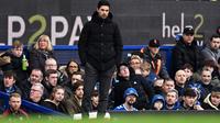 Manajer Arsenal, Mikel Arteta, menyayangkan kekalahan 0-1 dari Everton pada pada pertandingan pekan ke-22 Premier League 2022/2023 yang digelar di Goodison Park, Sabtu (4/2/2023) malam WIB. (AFP/Paul Ellis)