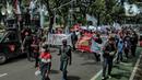 Massa aksi yang tergabung dalam Forum Masyarakat Rusunawa Marunda (F-MRM) saat menggelar aksi mengecam polusi debu batu bara di Balai Kota, Jakarta Pusat, Senin (28/3/2022). (merdeka.com/Iqbal S. Nugroho)