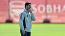 Pelatih Arsenal, Mikel Arteta menyatakan bahwa dalam sesi latihan harus memiliki elemen yang berbeda. Hal Itu harus terkait dengan pesan dan kompromi serta komitmen yang telah dibuat oleh tim. (AFP/Glyn Kirk)