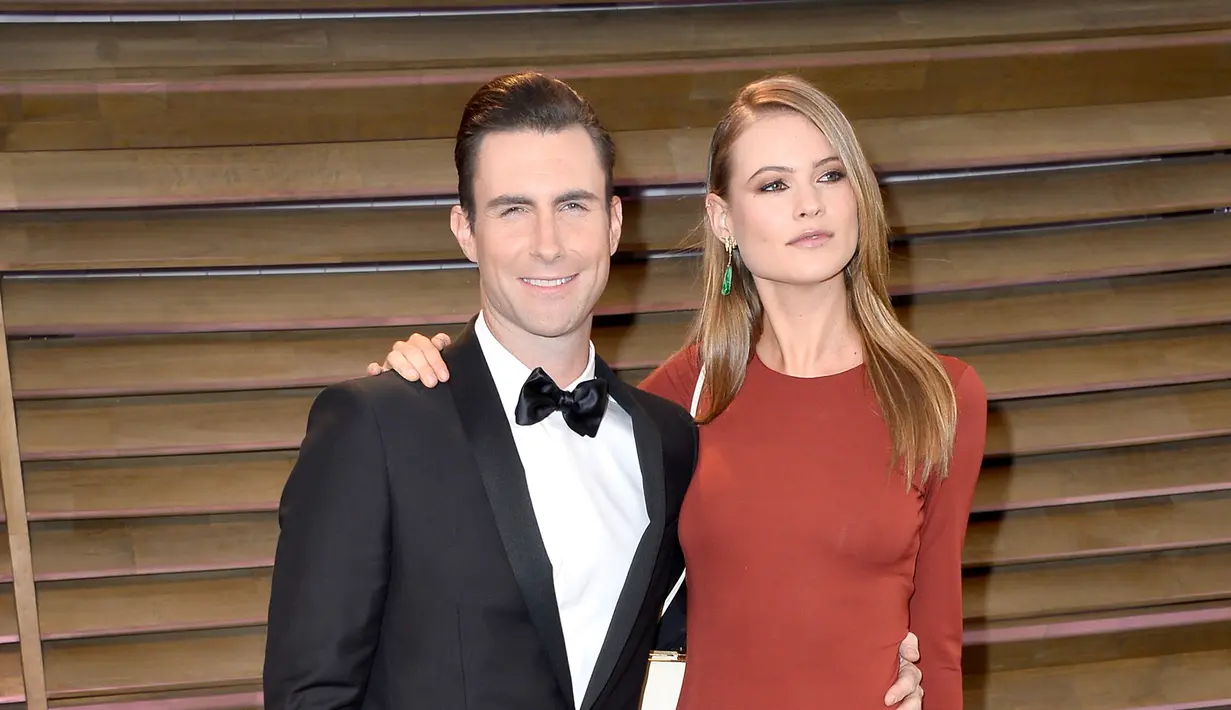 Kedatangan Dusty Rose Levine nampaknya semakin menghangatkan suasana kehidupan Adam Levine dan Behati Prinsloo. Keduanya nampak berbahagia dan selalu mengungkapkan dengan berbagai cara. (AFP/Bintang.com)