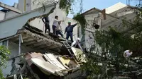 Bangunan hancur akibat gempa 7,1 SR mengguncang Meksiko. (AFP)