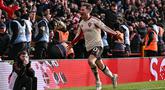 Alexis Mac Allister menjadi pencetak gol kemenangan Liverpool atas Nottingham Forest dalam laga lanjutan Liga Inggris 2025/2026 pada Minggu (22/02/2026). (AFP/Ben Stansall)