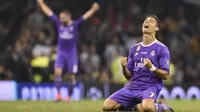 Bintang Real Madrid, Cristiano Ronaldo, merayakan gol yang dicetaknya ke gawang Juventus pada laga final Liga Champions di Stadion Stadion Millenium, Cardiff, Sabtu (3/6/2017). Madrid menang 4-1 atas Juventus. (AFP/Glyn Kirk)