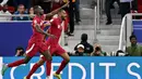 Qatar menang dramatis atas Iran dengan skor 3-2. (HECTOR RETAMAL/AFP)