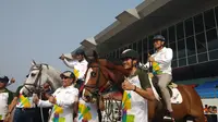 Wagub DKI Jakarta Sandiaga Uno dan Menteri Pertanian Amran di Equestrian Park, Pulomas, Jakarta, Sabtu (14/7/2018). (Liputan6.com/Ika Defianti)