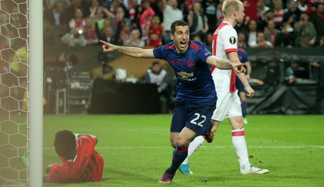 Selebrasi gelandang Manchester United, Henrikh Mkhitaryan setelah menjebol gawang Ajax Amsterdam pada laga final Liga Europa 2016/2017 di Friends Arena, Solna, Stockholm (24/5/2017). Henrikh Mkhitaryan total mencetak 6 gol dari 11 penampilan bersama MU dalam satu edisi Liga Europa yang diikutinya pada musim 2016/2017 dan mampu membawa Setan merah menjadi juara. (AFP/Soren Andersson)