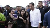 Jokowi nonton WTF 2018 (Hak Cipta: KapanLagi.com®/Agus Apriyanto/ssm)