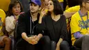 Kini kebahagiaan pun meliputi keluarga kecil Asthon Kutcher dan Mila Kunis. Dilansir dari People, Mila Kunis tengah mengandung benih cintanya dengan Asthon. (AFP/Bintang.com)