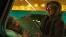 Gambar yang dirilis oleh Sony Pictures ini menunjukkan Bad Bunny (kiri) dan Brad Pitt dalam sebuah adegan film Bullet Train. Brad Pitt dikisahkan sebagai pembunuh bayaran yang tampaknya mendapat tugas mudah untuk mencari koper di kereta peluru. (Scott Garfield/Sony Pictures via AP)
