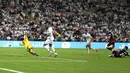 Tiga gol kemenangan Real Madrid atas Mallorca seluruhnya tercipta di babak kedua, masing-masing lewat aksi Jude Bellingham, bunuh diri Martin Valjent, dan Rodrygo. (AP Photo/Altaf Qadri)