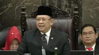 Ketua MPR Bambang Soesatyo (Bamsoet) memimpin sidang paripurna terakhir masa jabatan. Pada momen ini, Bamsoet sempat menyampaikan pantun soal pohon beringin diterjang badai dan topan. (Merdeka.com)