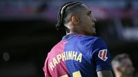 Pemain Barcelona, Raphinha dalam laga lanjutan Liga Spanyol 2024/2025 melawan Celta Vigo di Estadi Olimpic Lluis Companys, Barcelona, Spanyol, Sabtu (19/04/2025). (AFP/Josep Lago)