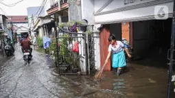 Banjir di kawasan Jakarta Barat ini terjadi akibat meningkatnya debit air Kali Kapuk. (Liputan6.com/Angga Yuniar)