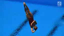 Atlet loncat indah saat tampil di final springboard 1m putri Asian Games 2018, Aquatic Centre, GBK, Jakarta, Jumat (31/8). Nomor ini dimenangkan oleh Wang Han asal China yang berhasil mendapatkan total skor 323.55. (Merdeka.com/Imam Buhori)