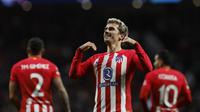 Rekan setim Alvaro Morata, Antoine Griezmann yang kini tengah menjalani musim ketiga bersama Atletico Madrid, di mana pada dua musim awal berstatus pinjaman dari Barcelona total mencetak 5 gol dari 6 laga di fase Grup E Liga Champions 2023/2024. (AFP/Oscar Del Pozo)