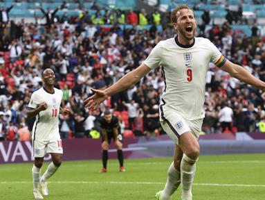 Pertandingan berjalan sengit dan seimbang. Inggris baru mencetak gol pertama di menit ke-75 lewat aksi Raheem Sterling dan Harry Kane menggandakannya di menit ke-86. Hasil ini mengantar Inggris ke babak perempat final. (Foto: AP/Pool/Andy Rain)