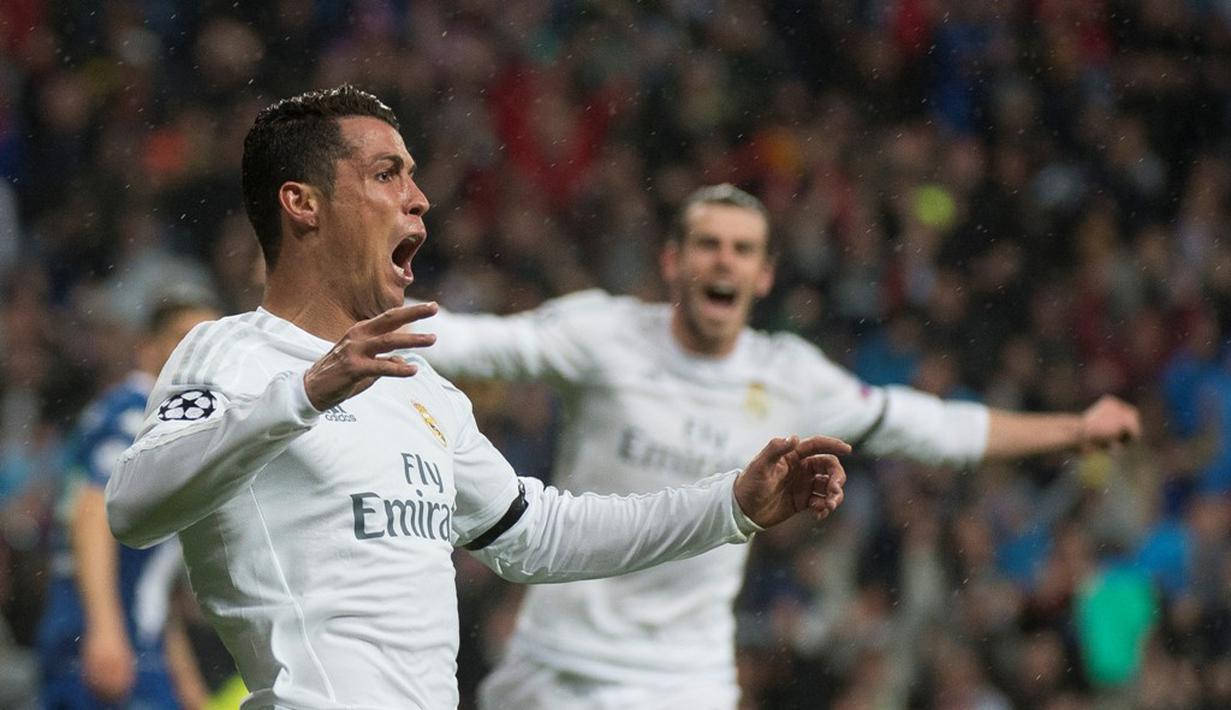 Cristiano Ronaldo mencetak hat-trick untuk membawa Real Madrid menang 3-0 atas VfL Wolfsburg pada leg kedua perempat final Liga Champions di Stadion Santiago Bernabeu, Madrid, Rabu (13/4/2016) dini hari WIB. (AFP/Curto De La Torre)