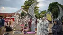 Para jemaah Muslim melaksanakan salat Idul Adha, atau Hari Raya Kurban, di balai kota Surabaya, Jawa Timur pada Rabu 27 Mei 2026. (Juni KRISWANTO/AFP)