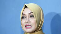 Setelah memutuskan berhijrah, presenter yang sering membawakan acara olahraga dan infotainment itu membantah mengurangi kegiatannya di layar kaca. Bahkan, setelah memutuskan berhijrah, kegiatannya makin banyak. (Nurwahyunan/Bintang.com)