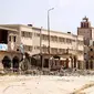 Foto yang diambil pada Juli 2017 di atas menunjukkan bagian dari Kota Benghazi, Libya yang hancur akibat konflik bersenjata menahun (AFP)