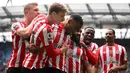 Sejak promosi ke Premier League pada awal musim 2021/2022, hingga kini Brentford mampu tampil impresif dengan kerap merepotkan tim-tim besar di Liga Inggris. Hingga pekan ke-26 musim 2022/2023, Brentford mampu menempati posisi ke-9 klasemen sementara, unggul satu tingkat dari Chelsea di posisi ke-10. Penampilan cemerlang Brentford musim ini tak lepas dari performa apik 5 penggawa asal Denmark berikut ini yang sebagian besar bahkan telah membela Brentford saat masih bermain di Championship. (AFP/Oli Scarff)