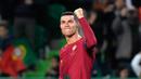 Pemain Portugal Cristiano Ronaldo merayakan gol ke gawang Liechtenstein pada pertandingan sepak bola Grup J Kualifikasi Euro 2024 di Stadion Jose Alvalade, Lisbon, Portugal, Kamis (23/3/2023). (AP Photo/Armando Franca)