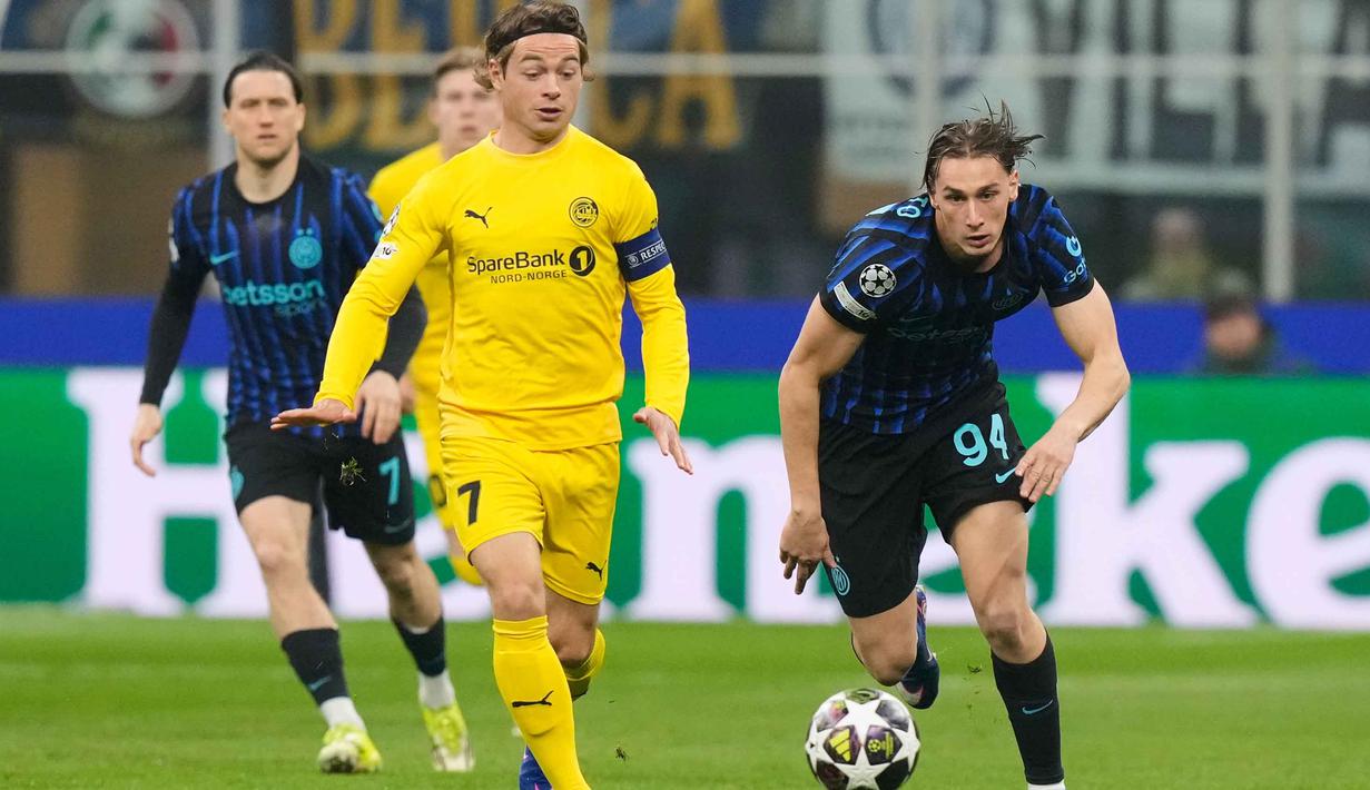 Begitu babak pertama dimulai, Inter Milan sudah tancap gas menggempur pertahanan Bodo/Glimt. Tampak dalam foto, pemain Inter Milan, Francesco Pio Esposito (kanan) berebut bola dengan Patrick Berg dari Bodo/Glimt selama pertandingan babak playoff Liga Champions 2025-2026 di stadion San Siro, Italia, Selasa 24 Februari 2026 waktu setempat atau Rabu (25/2/2026) dini hari WIB. (AP Photo/Luca Bruno)
