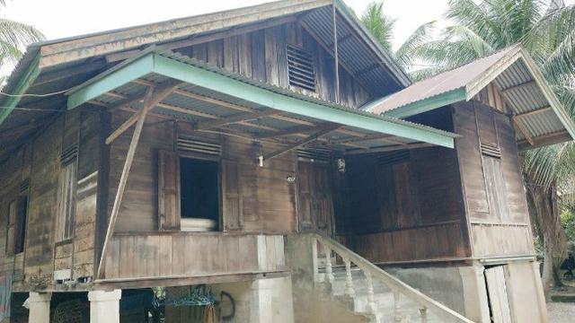 Rumah terduga teroris di Desa Kuapan, Kabupaten Kampar, yang digeledah Densus 88 Anti Teror.