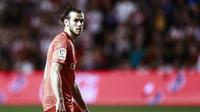 Ekspresi pemain Real Madrid, Gareth Bale, pada laga melawan Rayo Vallecano di Vallecas Stadium, Senin (29/4/2019) dini hari WIB. (AFP/Benjamin Cremel)