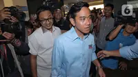 Bakal Calon Wakil Presiden dari Koalisi Indonesia Maju, Gibran Rakabuming Raka saat tiba di Hotel Grand Kemang, Jakarta, Senin (6/11/2023). (Liputan6.com/Angga Yuniar)