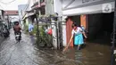 Banjir di kawasan Jakarta Barat ini terjadi akibat meningkatnya debit air Kali Kapuk. (Liputan6.com/Angga Yuniar)