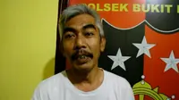 Anggota KPK Gadungan menjanjikan kelulusan PNS ditahan di kantor polisi. (Liputan6.com/M Syukur)