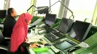 Mengintip Kesibukan Pemandu Pesawat di Bandara Minangkabau saat Musim Mudik 2019