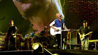 Konser Coldplay yang bertajuk A Head Full of Dreams menjadi konser paling mengguncang. Konser ini menghasilkan keuntungan sebesar Rp 5,4 trilliun. (KEVIN WINTER/GETTY IMAGES NORTH AMERICA/AFP)