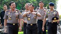  Kepala BIN Jendral Budi Gunawan dan Kapolri Jendral Tito Karnavian berjalan menuju Auditorium PTIK, Jakarta, Rabu (14/9). Polri melakukan tradisi penghantaran tugas Budi Gunawan sebagai Kepala BIN. (Liputan6.com/Helmi Afandi)