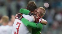 Timnas Denmark berhasil melaju ke babak semifinal Euro 2020 usai mematahkan tren positif Timnas Republik Ceska di pertandingan babak perempat final Euro 2020. Denmark lolos ke semifinal untuk pertama kalinya sejak 1992. (Foto: AP/Pool/Darko Vojinovic)