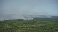 Kebakaran lahan di Riau yang berhasil dipotret petugas dari udara. (Liputan6.com/M Syukur)