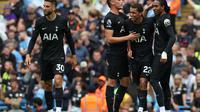 Para penggawa Tottenham merayakan gol ke gawang Man City dalam lanjutan Liga Inggris 2025/2026 di Etihad Stadium, Sabtu (23/8/2025). (Darren Staples / AFP)