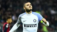 Striker Inter Milan, Mauro Icardi, melakukan selebrasi setelah membobol gawang Cagliari pada laga Serie A, di Stadio Sant'Elia, Minggu (26/11/2017) dini hari WIB. (AFP/Alberto Pizzoli).
