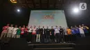 Ketua Umum Persatuan Bola Voli Seluruh Indonesia (PBVSI) Imam Sudjarwo (kesebelas kiri) bersama pihak terkait dan manajer tim usai memberikan keterangan terkait pelaksanaan PLN Mobile Proliga 2025 di Jakarta, Selasa (17/12/2024). (Liputan6.com/Helmi Fithriansyah)