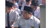 Potret bocah viral mirip karakter Russell di film Up. (Sumber: TikTok/firyalll86)