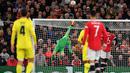 De Gea telah mencegah gol Villarreal datang lebih cepat dengan beberapa penyelamatan luar biasa untuk menggagalkan upaya wakil Spanyol itu. Ia pun membayar kesalahannya ketika agal mengeksekusi penalti krusial dalam kekalahan di final Liga Europa musim lalu. (AFP/Anthony Devlin)