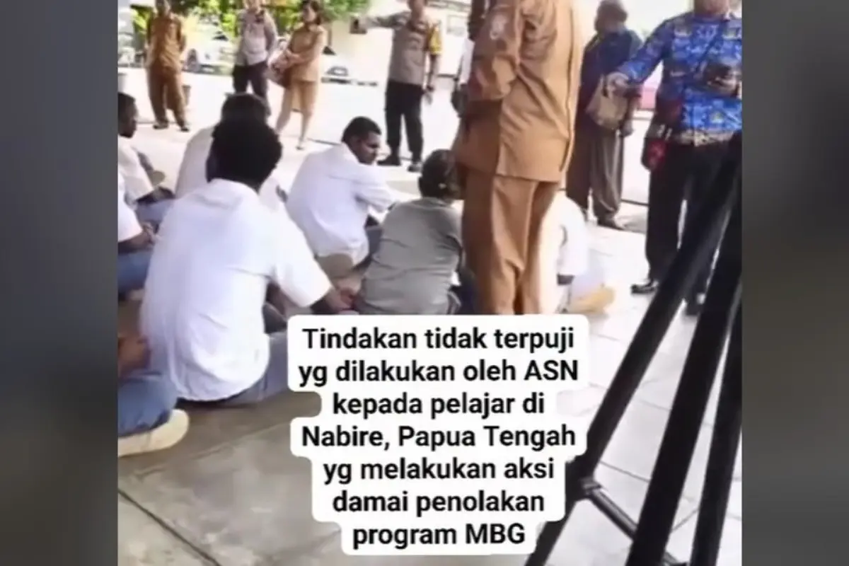 ASN yang Tendang Siswa Demo Tolak Makan Bergizi Gratis di Papua Bikin Video Permintaan Maaf.  foto: TikTok @callmynayakh