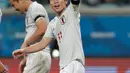 Gelandang Jepang, Koji Miyoshi berselebrasi usai mencetak gol keduanya ke gawang Uruguay selama pertandingan grup C Copa America 2019 di Arena Gremio di Porto Alegre, Brasil (20/6/2019). Jepang bermain imbang 2-2 atas Uruguay. (AP Photo/Silvia Izquierdo)