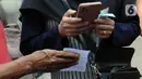 Kegiatan sembako murah akan secara rutin digelar di kelurahan di seluruh DKI Jakarta. Hal ini dilakukan untuk menjaga inflasi dengan menghadirkan stabilitas harga bahan pangan pokok agar bisa dijangkau warga. (merdeka.com/Imam Buhori)