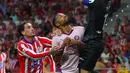 Bermain di markas sendiri, Atletico Madrid tampil menyerang sejak menit awal pertandingan. (Pierre-Philippe MARCOU/AFP)